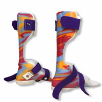Solid ankle AFO with moderately flexible posterior strut and a protective inner boot that aids in reducing tone/spasticity.